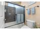 Modern bathroom showcases a tub with shower, blue towels, and clean, bright design at 4340 S Marble St, Gilbert, AZ 85297