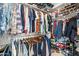 Organized walk-in closet offering plenty of storage and space for clothes and shoes at 4340 S Marble St, Gilbert, AZ 85297