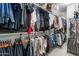 Walk-in closet featuring ample hanging space, shelving, and storage for clothes and accessories at 4340 S Marble St, Gilbert, AZ 85297