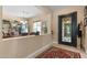 Welcoming home entrance with tile flooring, decorative rug, and elegant front door at 4340 S Marble St, Gilbert, AZ 85297