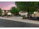 Charming home with a well-manicured front yard and desert landscaping, with a driveway leading to a two-car garage at 4340 S Marble St, Gilbert, AZ 85297
