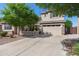 Inviting two-story home with a well-kept lawn and an attached two-car garage at 4340 S Marble St, Gilbert, AZ 85297