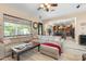 Comfortable living room adjacent to kitchen area, tile floors, and neutral decor at 4340 S Marble St, Gilbert, AZ 85297