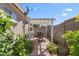 Inviting outdoor patio area with a pergola and cozy seating, perfect for relaxing and entertaining at 4340 S Marble St, Gilbert, AZ 85297