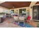 Well-appointed patio with an outdoor kitchen, ample seating, and stylish decor, perfect for al fresco dining and entertaining at 4340 S Marble St, Gilbert, AZ 85297