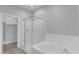 Bathroom with new fixtures, a glass-enclosed shower, and a soaking tub for relaxation at 4777 S Fulton Ranch Blvd # 1029, Chandler, AZ 85248