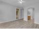 Bright, spacious bedroom with wood-look flooring, leading to bathroom and outdoor access at 4777 S Fulton Ranch Blvd # 1029, Chandler, AZ 85248
