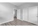 Bedroom with wood-look floors and a closet with sliding doors at 4777 S Fulton Ranch Blvd # 1029, Chandler, AZ 85248