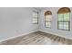 Bedroom featuring natural light from large windows with window coverings, and wood flooring at 4777 S Fulton Ranch Blvd # 1029, Chandler, AZ 85248