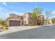 Charming two-story home with a well-maintained front yard and a two-car garage at 4777 S Fulton Ranch Blvd # 1029, Chandler, AZ 85248
