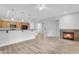 Bright and open living room with a fireplace and connecting kitchen at 4777 S Fulton Ranch Blvd # 1029, Chandler, AZ 85248