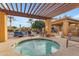 Relaxing hot tub area under a pergola, offering comfortable seating and shade near the main pool at 4777 S Fulton Ranch Blvd # 1029, Chandler, AZ 85248