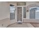 Elegant front entrance with decorative door, windows, and arched details, offering a welcoming first impression at 4809 W Erie St, Chandler, AZ 85226