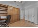 Spacious office with a desk, built-in cabinets, and closet space for optimal organization at 4809 W Erie St, Chandler, AZ 85226