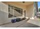 Covered patio with textured stucco wall, ideal for outdoor entertaining or relaxing in shade at 4809 W Erie St, Chandler, AZ 85226