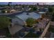 Aerial view of property featuring lovely backyard, patio with string lights at 5206 S Clark Dr, Tempe, AZ 85283