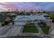 Charming single-story home featuring a well-manicured front yard and an attached two-car garage at 5206 S Clark Dr, Tempe, AZ 85283