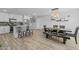 Bright living space with kitchen island, dining table, and inviting atmosphere at 5206 S Clark Dr, Tempe, AZ 85283
