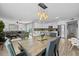 Open floor plan featuring dining area leading to the updated kitchen and a spacious living room at 5206 S Clark Dr, Tempe, AZ 85283