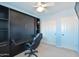Bedroom with a built-in Murphy bed with shelving and desk, offering a modern, space-saving solution at 5513 E Grovers Ave, Scottsdale, AZ 85254