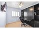 Bedroom with a built-in Murphy bed and shelving, providing a versatile and functional living space at 5513 E Grovers Ave, Scottsdale, AZ 85254