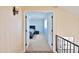 Hallway view leading to a bedroom, showcasing the open layout and inviting atmosphere of the home at 5513 E Grovers Ave, Scottsdale, AZ 85254