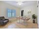Bright home office featuring stylish decor, wood floors, shuttered windows, and modern accents at 5513 E Grovers Ave, Scottsdale, AZ 85254