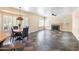 Spacious living room with fireplace and plantation shutters, perfect for relaxing and entertaining guests at 5513 E Grovers Ave, Scottsdale, AZ 85254