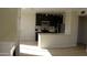 Contemporary kitchen with stainless steel appliances and breakfast bar at 7009 E Acoma Dr # 2013, Scottsdale, AZ 85254