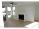 Bright living room with a ceiling fan and fireplace at 7009 E Acoma Dr # 2013, Scottsdale, AZ 85254