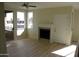 Bright living room with a ceiling fan and fireplace at 7009 E Acoma Dr # 2013, Scottsdale, AZ 85254