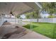 Backyard featuring a pool, lawn, covered patio, and outdoor space for entertaining at 711 N 22Nd St, Mesa, AZ 85213