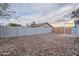 Spacious backyard featuring rock landscaping, a privacy wall, and gated access at 711 N 22Nd St, Mesa, AZ 85213