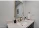 Modern bathroom vanity featuring white marble countertop and gold hardware, offering luxury at 711 N 22Nd St, Mesa, AZ 85213