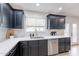 Beautifully renovated kitchen features modern cabinets and stainless steel appliances at 711 N 22Nd St, Mesa, AZ 85213