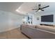 Bright living room with wood floors, neutral decor, and a ceiling fan at 711 N 22Nd St, Mesa, AZ 85213
