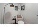 Comfortable sitting area with stylish chair and lighting, perfect for reading and relaxation at 711 N 22Nd St, Mesa, AZ 85213