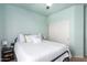Cozy bedroom with a bed, ceiling fan, closet, and an accent table with lamp at 7170 W Crystal Rd, Glendale, AZ 85308