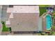 Aerial view of a home with a private backyard pool and lush green lawn at 740 N Bradley Dr, Chandler, AZ 85226