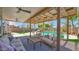Luxurious backyard featuring a sparkling pool, lush landscaping, covered patio, and inviting seating area for entertaining at 740 N Bradley Dr, Chandler, AZ 85226