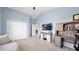 Spacious bedroom with vaulted ceilings and desk area at 740 N Bradley Dr, Chandler, AZ 85226