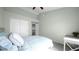 Relaxing bedroom featuring a comfortable bed, closet, and soft colors at 740 N Bradley Dr, Chandler, AZ 85226