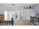 Upstairs landing featuring two entryways and railing with black iron spindles at 740 N Bradley Dr, Chandler, AZ 85226