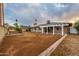Expansive backyard featuring lush greenery and mature trees, offering a private outdoor sanctuary at 7605 N 45Th Dr, Glendale, AZ 85301