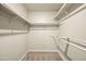 Organized walk-in closet with ample shelving and storage options, maximizing space and functionality at 7605 N 45Th Dr, Glendale, AZ 85301