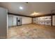 Garage featuring refrigerator and ample storage, providing convenience and organizational opportunities at 7605 N 45Th Dr, Glendale, AZ 85301