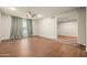 Large living room with hardwood floors and abundant natural light at 7605 N 45Th Dr, Glendale, AZ 85301