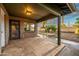 View of the patio, showing access to the yard and a glimpse of interior at 7605 N 45Th Dr, Glendale, AZ 85301
