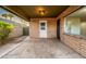 Covered patio with a brick accent wall, leading to backyard at 7605 N 45Th Dr, Glendale, AZ 85301