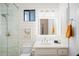 Modern bathroom with a marble shower, sleek vanity, and contemporary fixtures at 7788 E Morning Vista Ln, Scottsdale, AZ 85266
